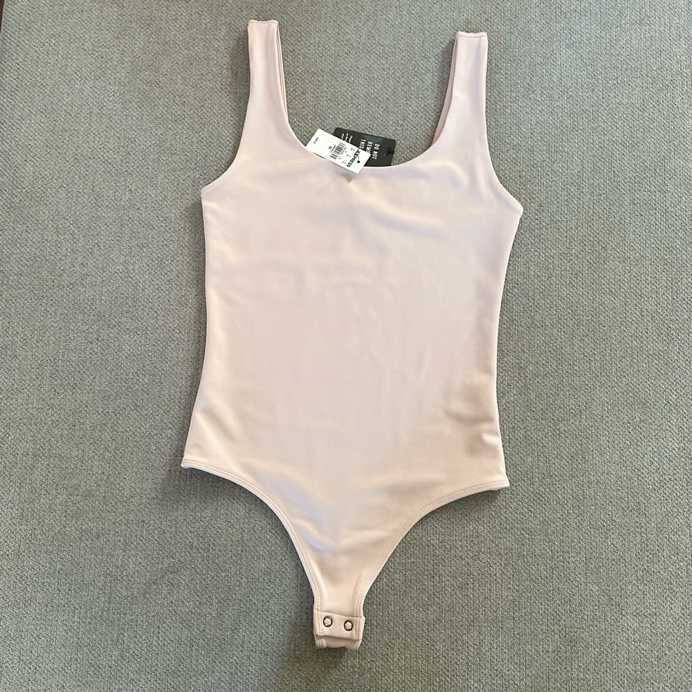 Express Body Contour Bodysuit in Pale Pink NWT